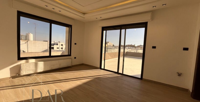 Top-Floor Apartment with Rooftop on Airport Road – Amman, Jordan