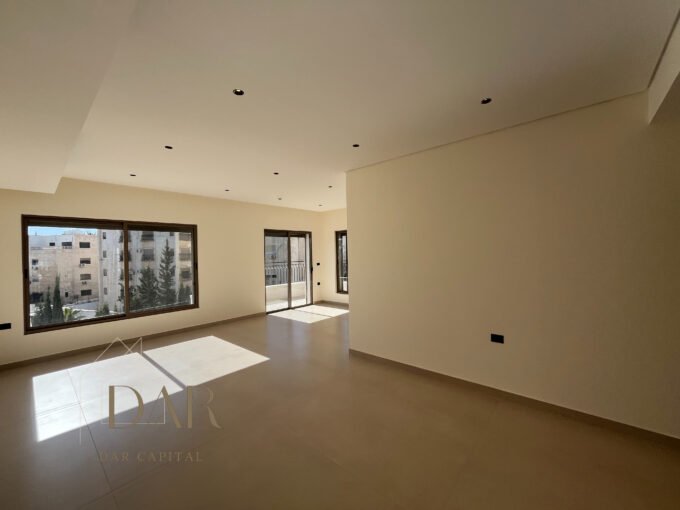 Second-Floor Apartment in Um Al Summaq For Sale