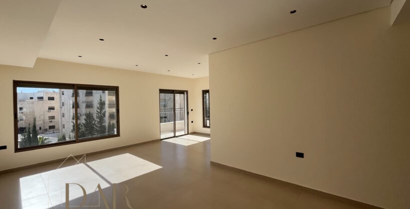 Second-Floor Apartment in Um Al Summaq For Sale