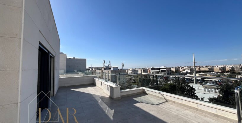 Duplex Top-Floor Apartment with Roof in Al Rawnak For Sale